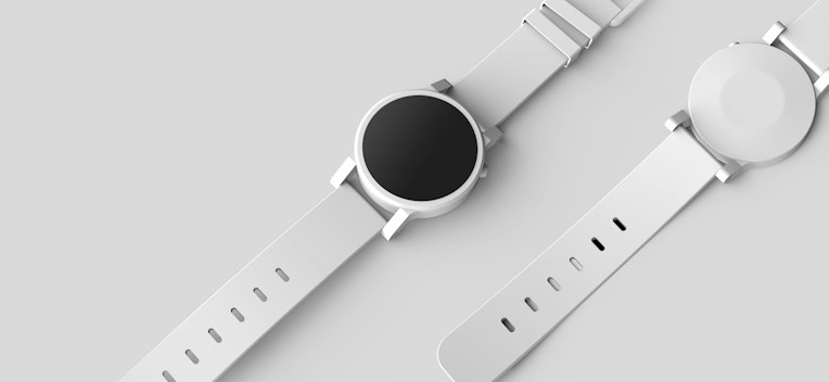 Two smartwatches laid out for product evaluation